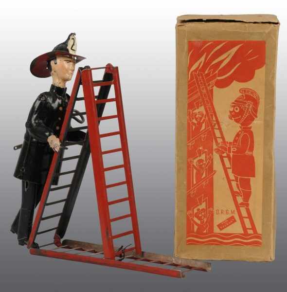 Appraisal: Tin Fireman Climbing Ladder Wind-Up Toy Description German Working All