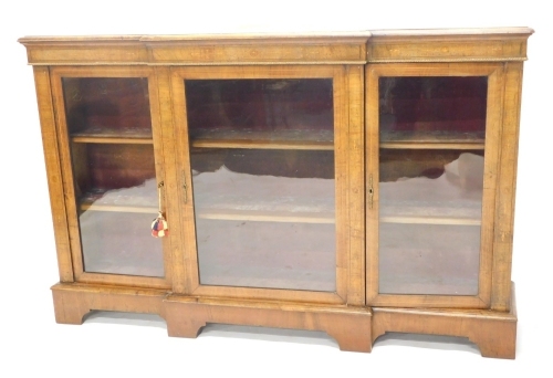 Appraisal: A Victorian walnut breakfront credenza with giltwood rope twist moulding