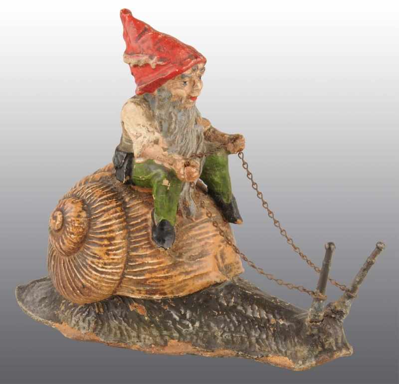 Appraisal: Elastolin Elf Riding Snail Still Bank Description Manufactured in Germany