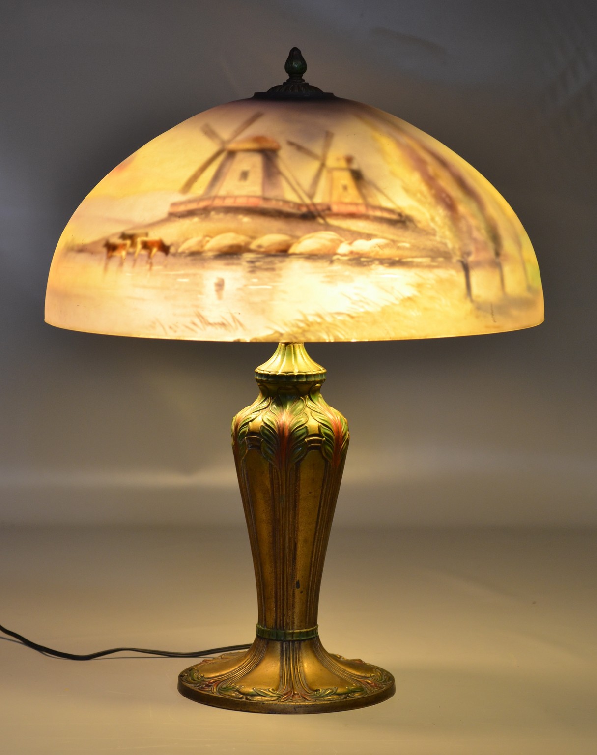 Appraisal: Pairpoint reverse painted table lamp shade with windmill and landscape