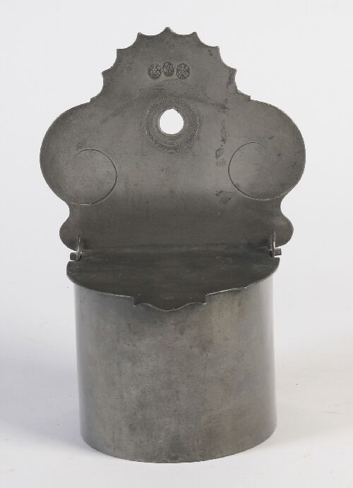 Appraisal: A th century hanging pewter salt box the shaped base