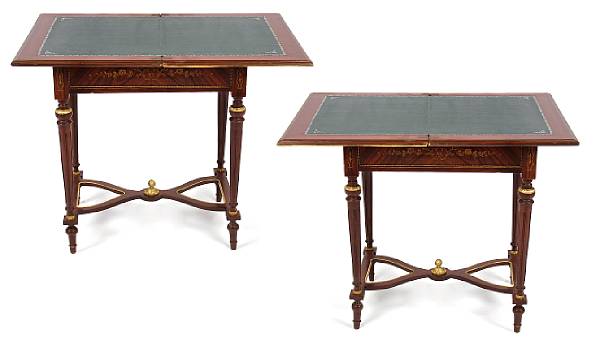 Appraisal: A pair of Louis XVI style fold top games tables