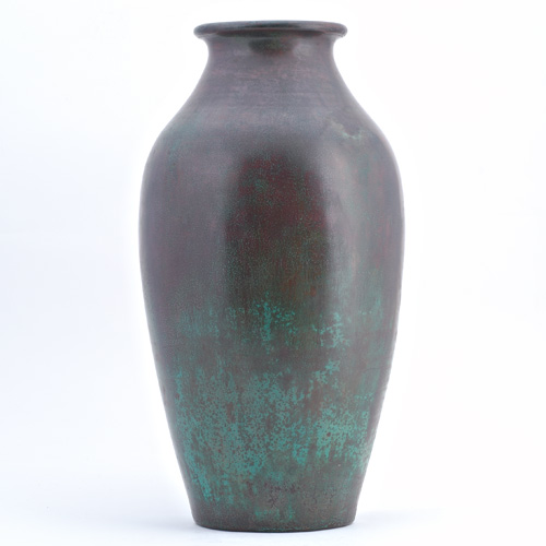 Appraisal: CLEWELL Copper-clad tall baluster vase covered in a good bronze