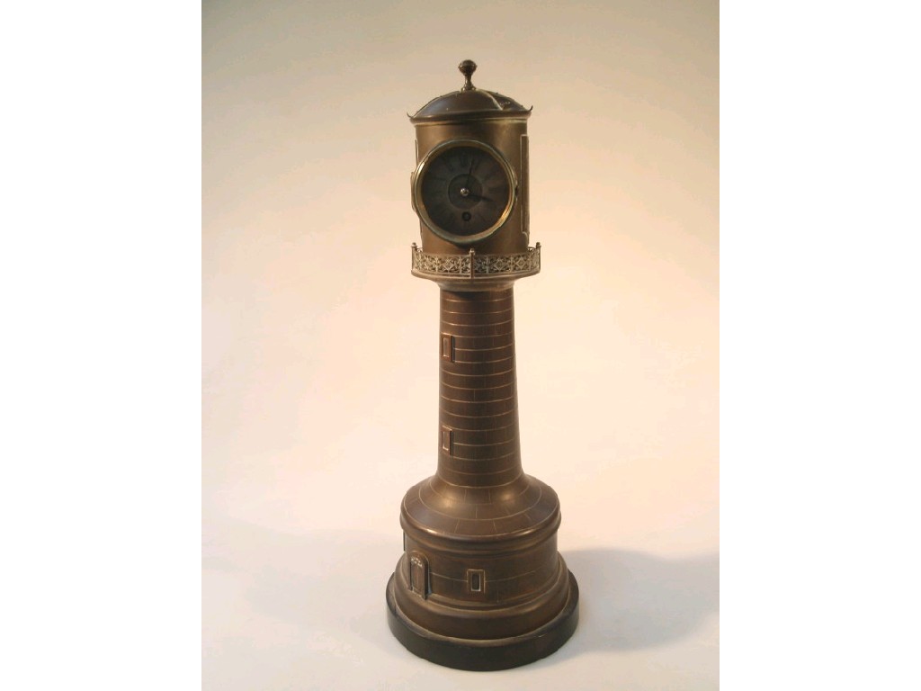 Appraisal: An unusual late Victorian lighthouse clock in a brass case