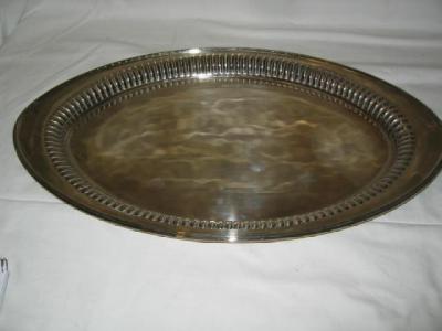 Appraisal: A LATE VICTORIAN TRAY of oval form the flared rim