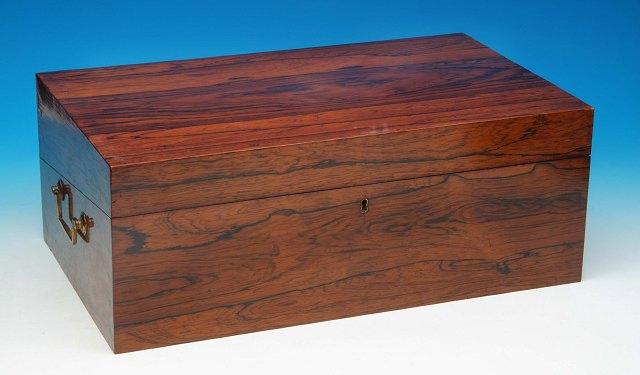 Appraisal: A large Victorian rosewood writing box with brass handles wide