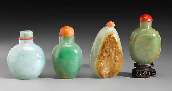 Appraisal: A group of four jade snuff bottles The first of