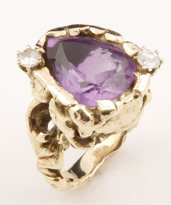 Appraisal: KY one pear shaped amethyst color medium purple two dimaonds