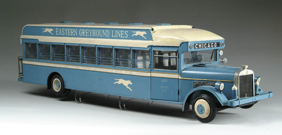 Appraisal: LARGE HANDMADE MODEL OF GREYHOUND BUS Logging over hours on