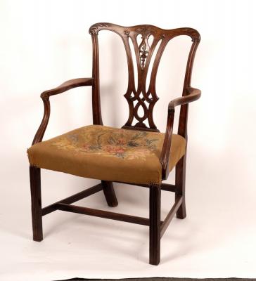 Appraisal: A George III mahogany armchair of Chippendale design with carved