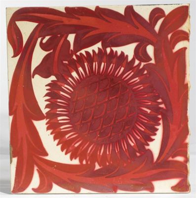 Appraisal: A William De Morgan tile painted with a sunflower in