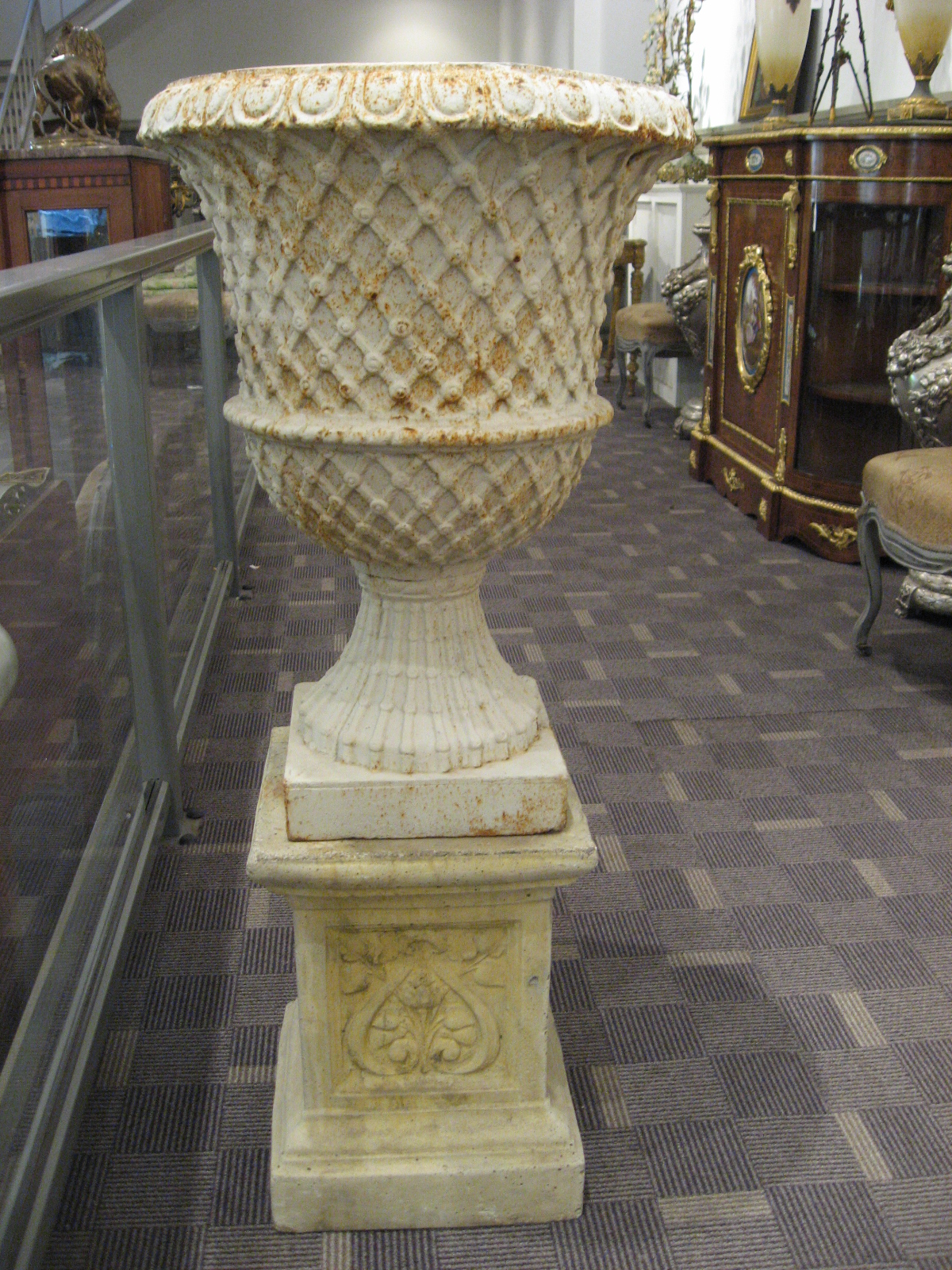 Appraisal: Pair of neoclassical style cast iron garden urns Each of