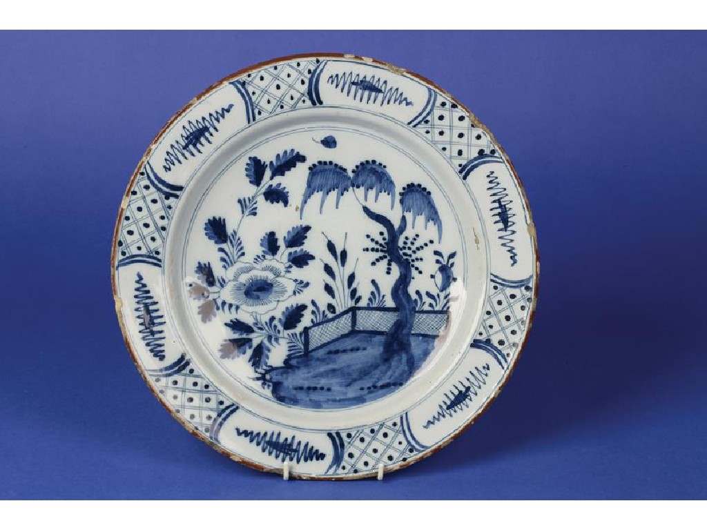 Appraisal: A DELFTWARE BLUE AND WHITE CHARGER decorated with an Oriental