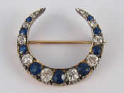 Appraisal: A fine Victorian sapphire and diamond crescent brooch the old