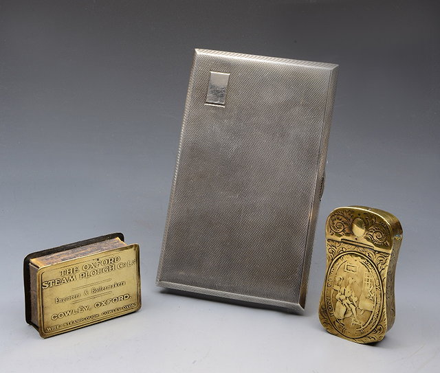 Appraisal: A SILVER CIGARETTE CASE with engine turned decoration cm long