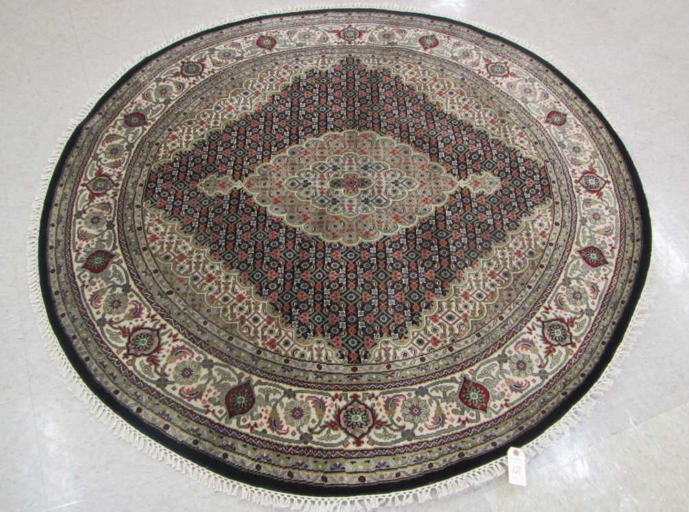 Appraisal: ROUND ORIENTAL AREA RUG Indo-Bijar overall Herati floral design on