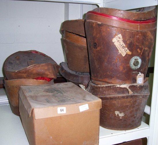 Appraisal: A quantity of leather cased top hats various makers