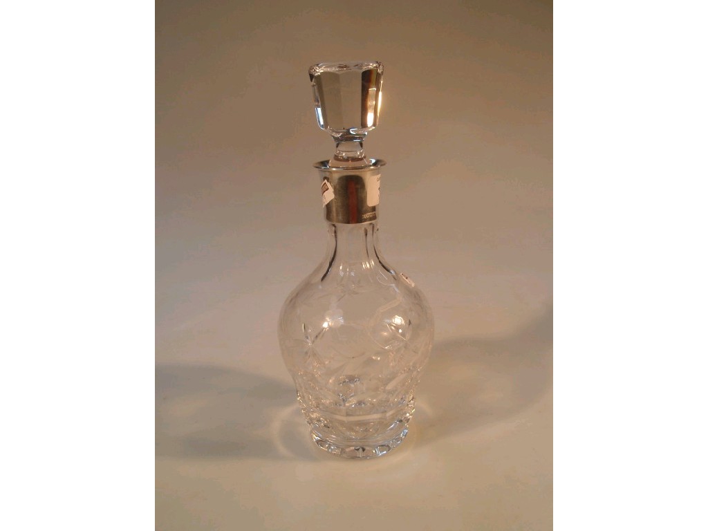 Appraisal: A modern cut glass decanter of ovoid form cut with