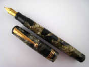 Appraisal: A Swan Mabie Todd Leverless fountain pen in mottled grey