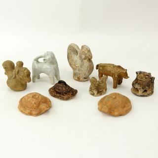 Appraisal: Collection of Nine Early Chinese Pottery and Stone Mat Weights