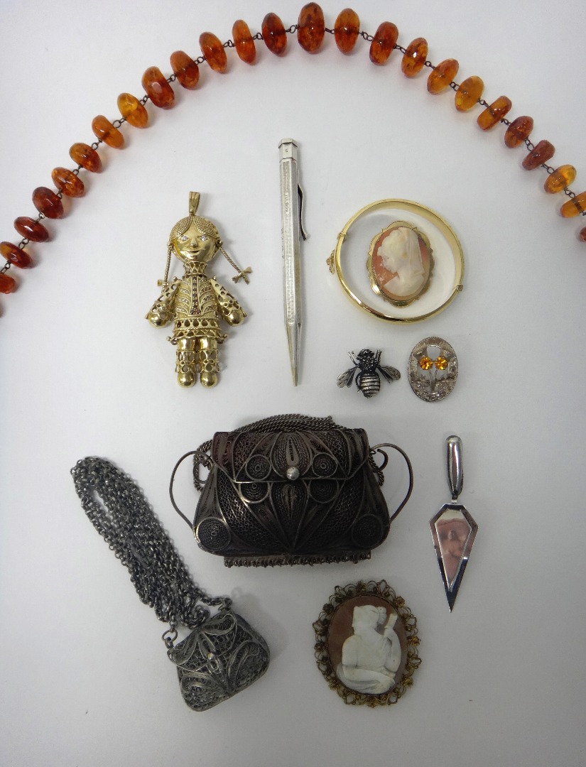 Appraisal: A silver gilt and gem set pendant designed as a