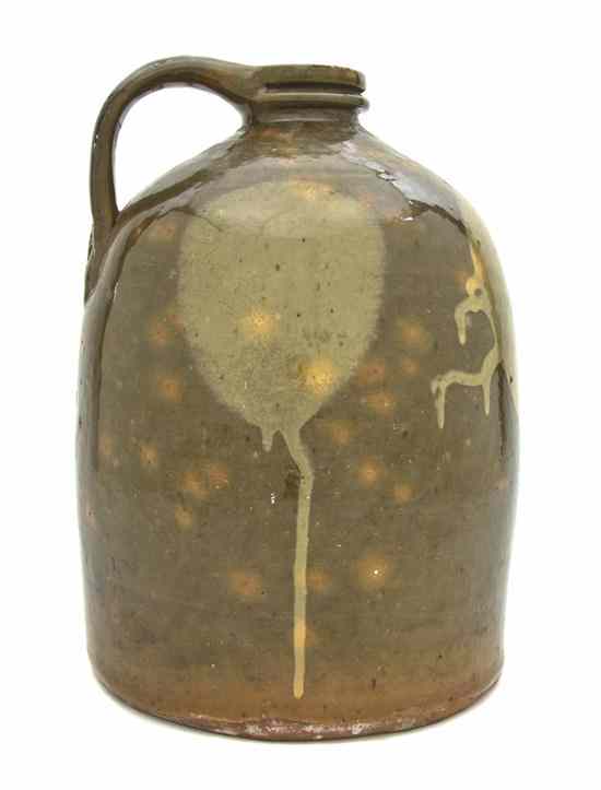 Appraisal: An American Alkaline Glazed Stoneware Jug of typical form with