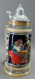 Appraisal: A German beer stein with pewter lid cobalt blue and