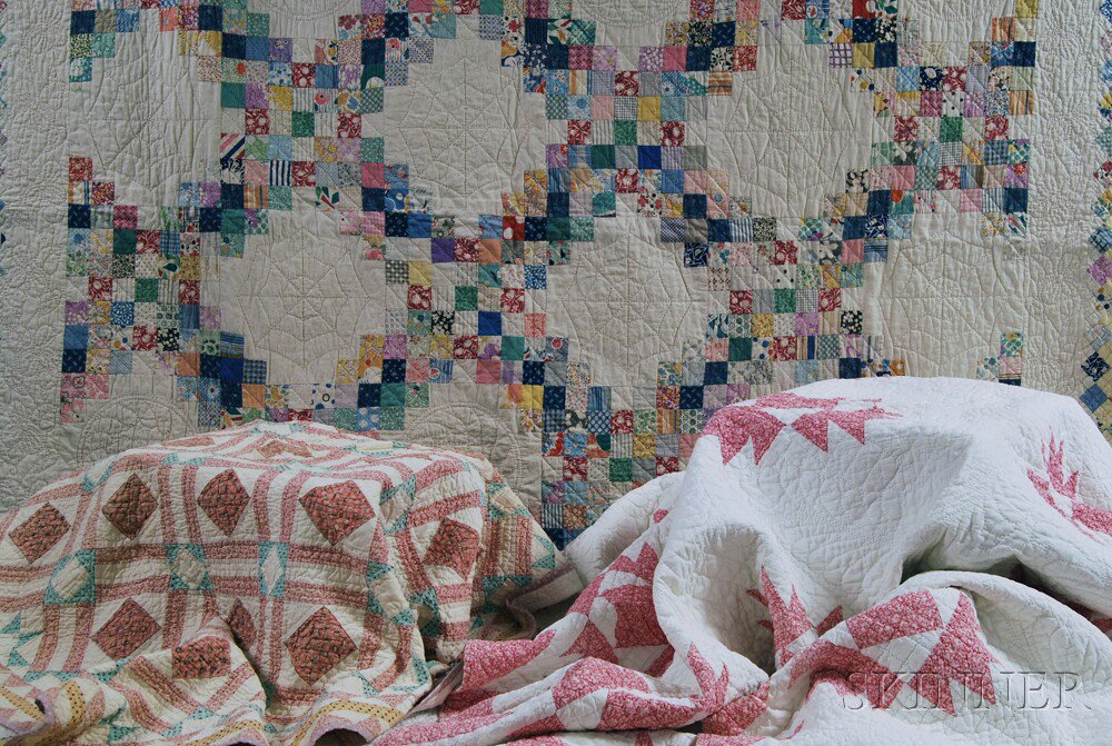 Appraisal: Three Quilts including a pieced machine-stitched cotton quilt a crib