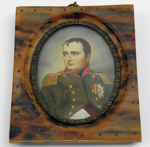 Appraisal: A MINIATURE OVAL PORTRAIT ON IVORY in tortoise shell frame