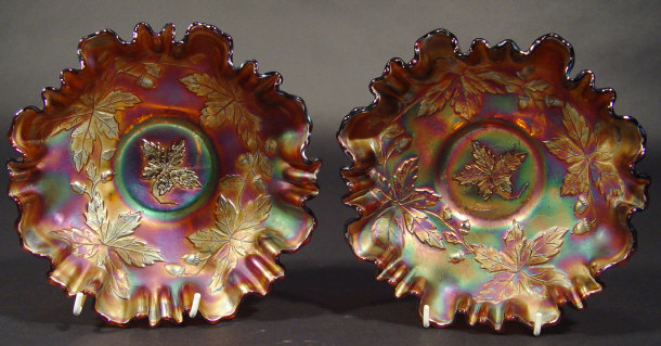 Appraisal: Two purple Carnival glass dishes moulded with oak leaves and