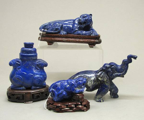 Appraisal: Three lapis lazuli or sodalite animals and a covered ram