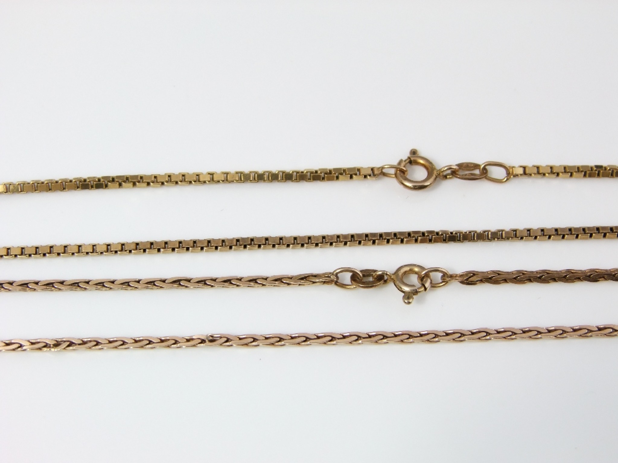 Appraisal: Two ct gold link necklaces of various designs gm