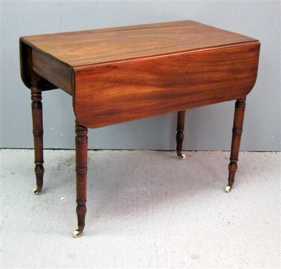 Appraisal: th century mahogany pembroke table with a single frieze drawer