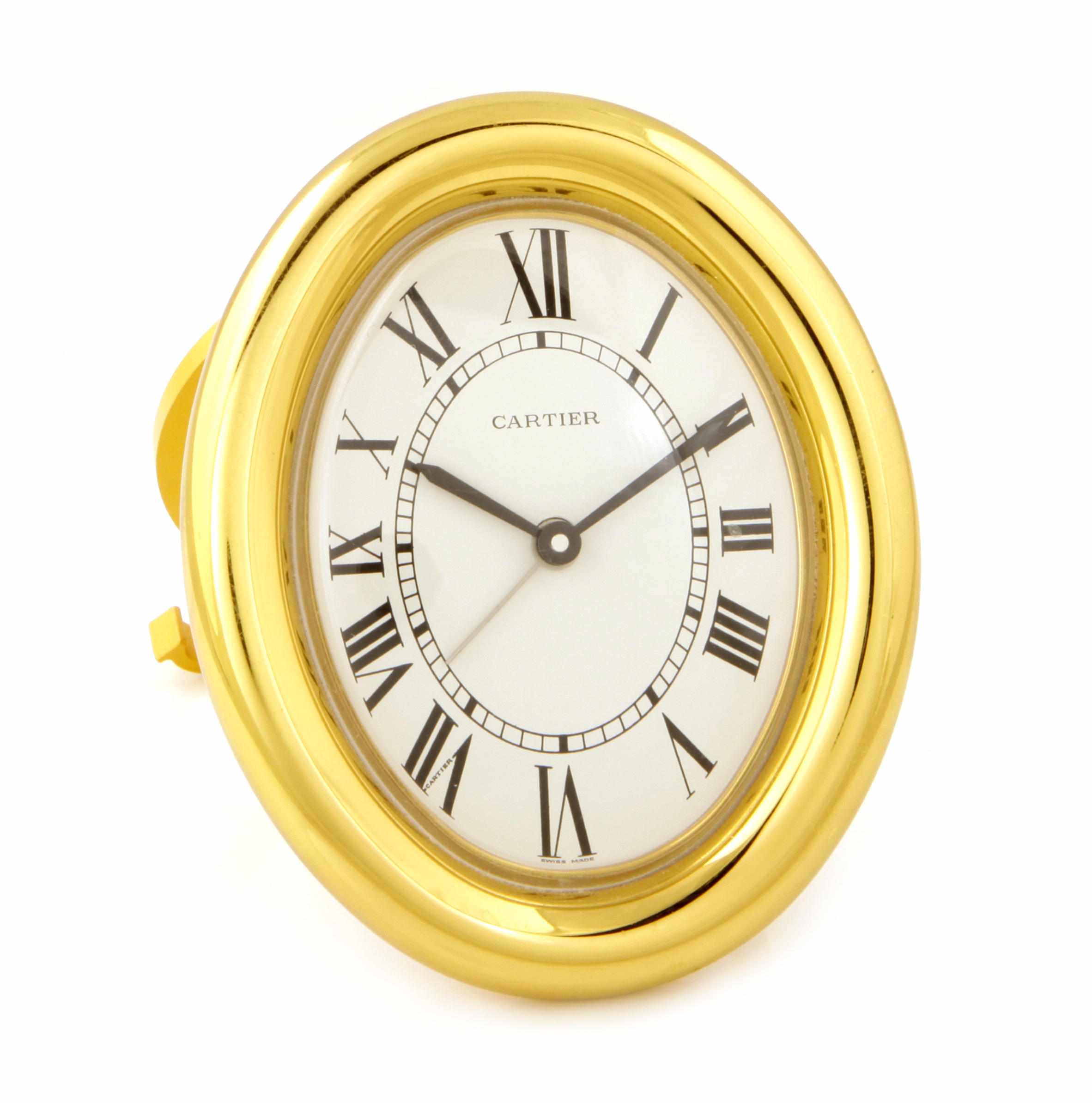 Appraisal: An oval-shaped quartz table clock Cartier signed Cartier with signed