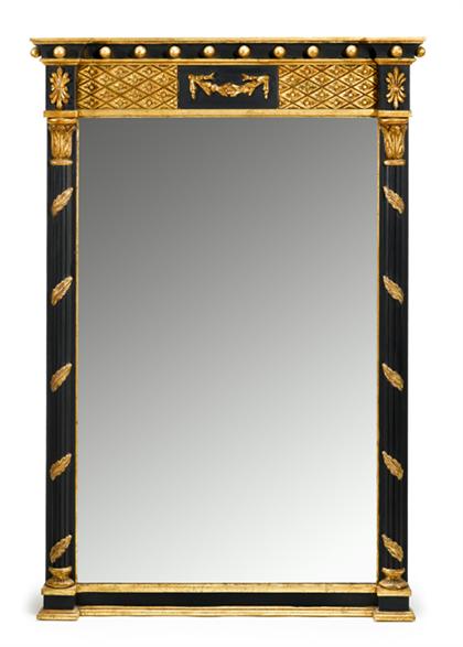 Appraisal: Regency style ebonized and gilt painted wall mirror The rectangular