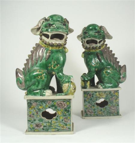 Appraisal: A pair of late th century Chinese lion dogs each