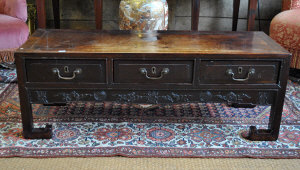 Appraisal: A pair of Chinese rosewood low tables each with three