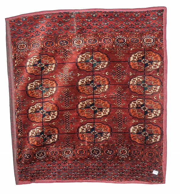 Appraisal: A TEKKE TURKOMAN RUG FRAGMENT with three rows of guls