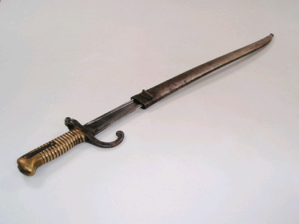 Appraisal: A thC French brass handled bayonet with scabbard