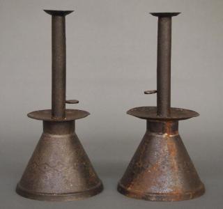 Appraisal: Pr Iron candleholders A pair of th century iron candlesticks