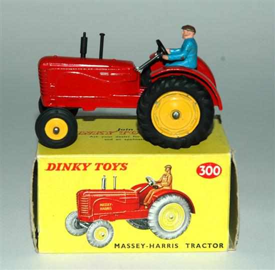 Appraisal: Dinky Massey-Harris Tractor red black plastic smoke stack blue plastic