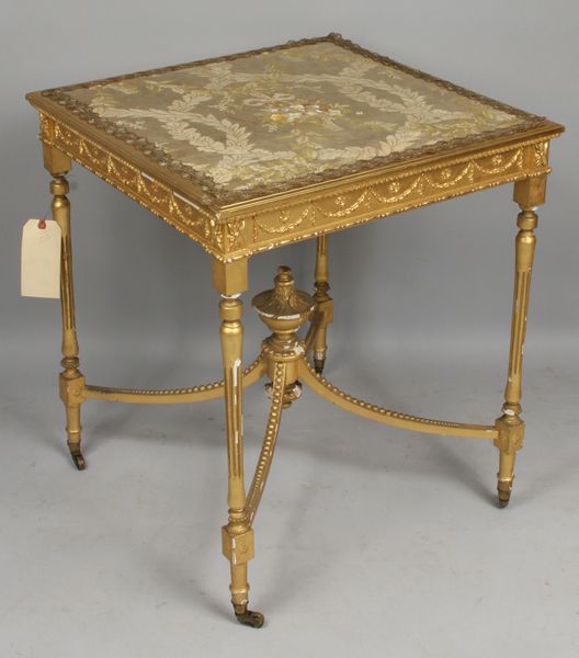 Appraisal: th Century giltwood table with embroidered top h x x