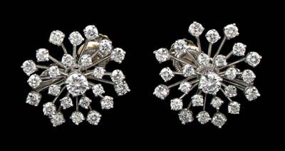 Appraisal: Pair diamond and platinum ear clips radiant floral motif round