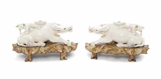 Appraisal: A Pair of Chinese Carved Ivory Buffalo each depicting the