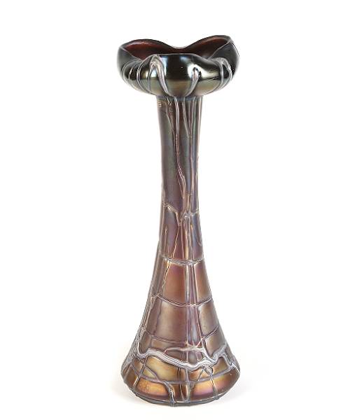 Appraisal: An Austrian iridescent glass vase with applied decoration circa height