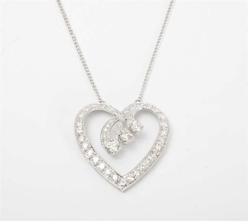 Appraisal: K WHITE GOLD AND DIAMOND HEART NECKLACE Set with old