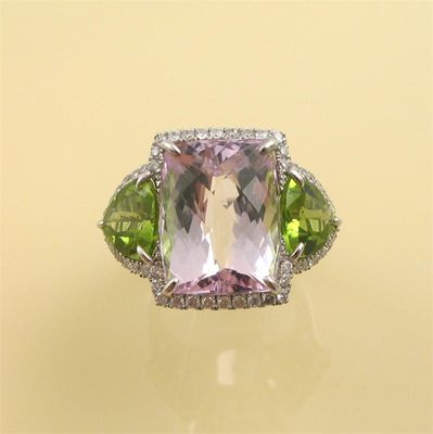 Appraisal: A kunzite and peridot dress ring set with a large