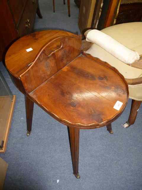 Appraisal: A GEORGIAN STYLE YEW WOOD BUTLER'S TABLE with cutlery box