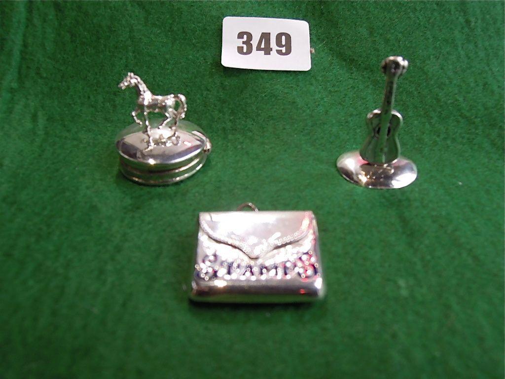 Appraisal: A silver and enamelled stamp box stamped a silver pill