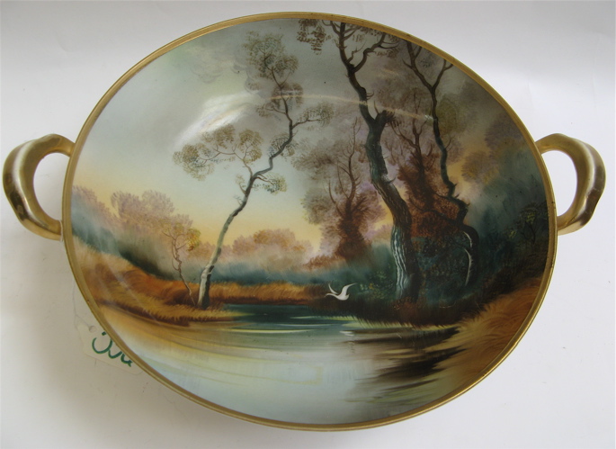 Appraisal: NORITAKE HAND PAINTED PORCELAIN BOWL with trees along a stream